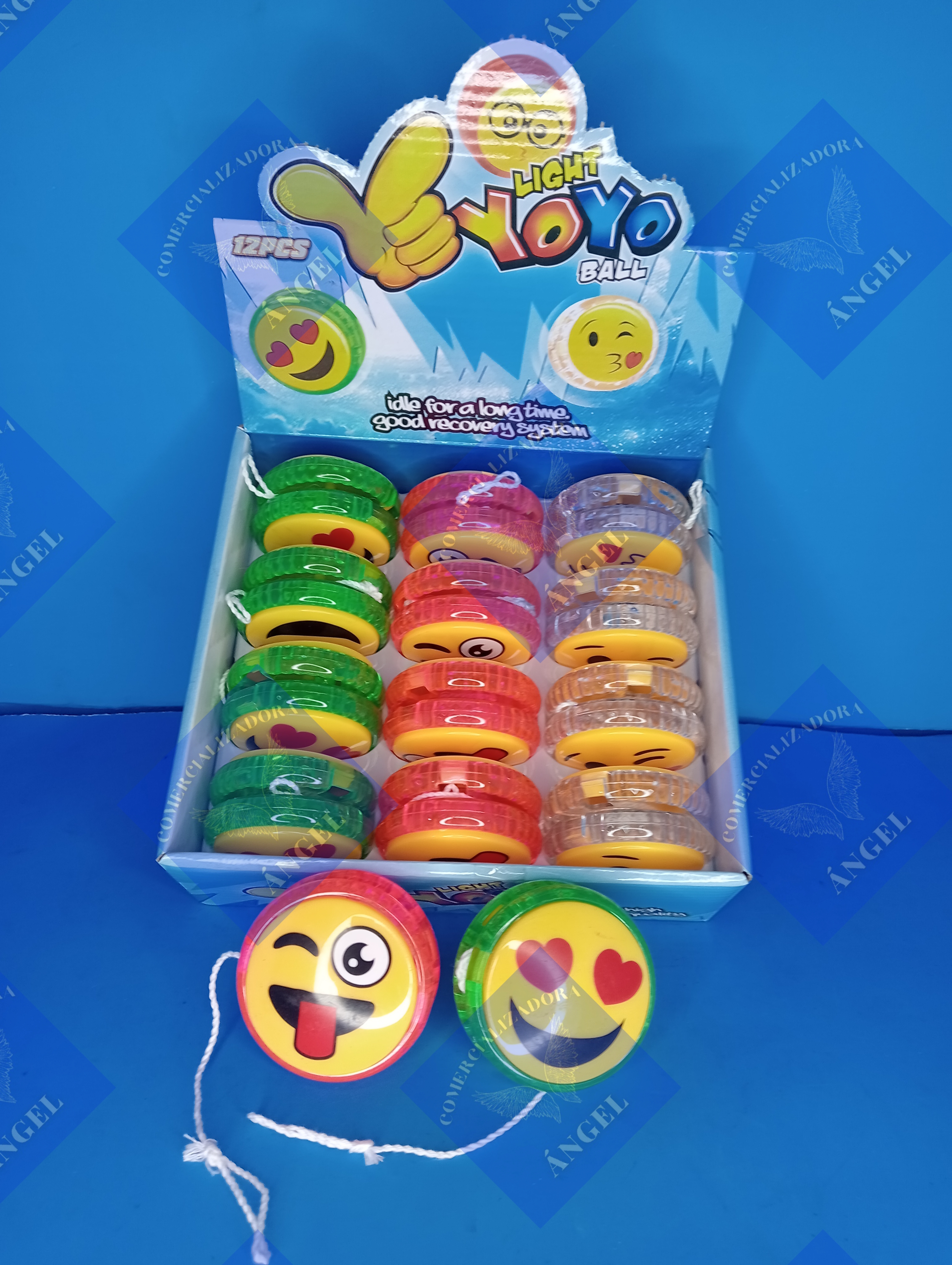 Caja con 12 yoyos de emoji con luz